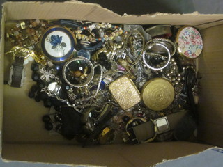 A collection of costume jewellery, compacts, wristwatches etc