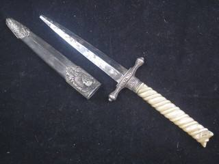 A double bladed poignard with mother of pearl grip, point f, 8"