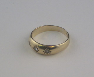 An 18ct gold dress ring set diamonds