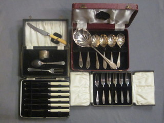 A set of 6 silver plated fruit spoons and server, a set of 6 silver  tea knives, a set of 6 silver plated pastry forks and a 4 piece  silver plated christening set, cased