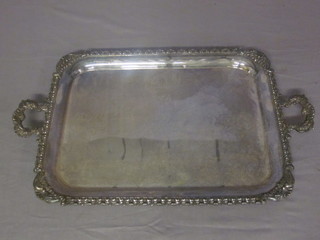 A rectangular silver plated twin handled tea tray with embossed borders 15"