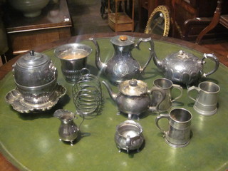 A Britannia metal teapot of melon form, ditto coffee pot and a collection of plated items