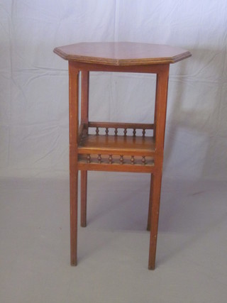 A Edwardian Arts & Crafts tall octagonal mahogany 2 tier occasional table with bobbin turned decoration, raised on square  supports 24"