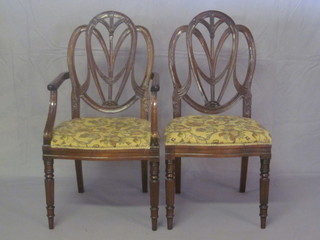 A set of 8 Hepplewhite style shield and feather back dining chairs  with upholstered seats, raised on turned and reeded supports - 2  carvers, 6 standard