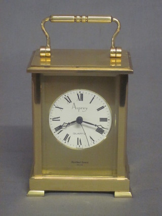 A 20th Century battery operated carriage clock by Asprey's  contained in a gilt metal case 3"