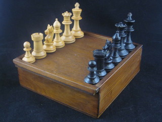 A Staunton box wood and ebony chess set, boxed