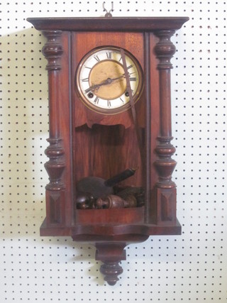 A chiming Vienna style regulator contained in a walnut case,  glass damaged,
