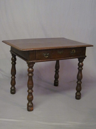 A 17th Century oak side table fitted a drawer and raised on  turned supports 35"