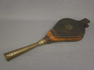 A 19th Century elm and brass yacht fog horn, decorated Royal  Arms and marked Triton