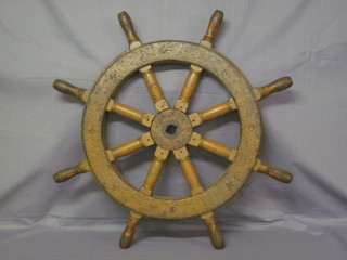 A wooden and metal 8 spoked ships wheel 36"