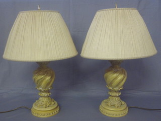 A pair of wooden finished table lamps