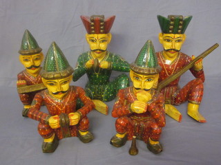A 5 piece Indian carved wooden and painted band