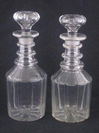 A matched pair of 19th Century club shaped, ring necked  decanters and stoppers