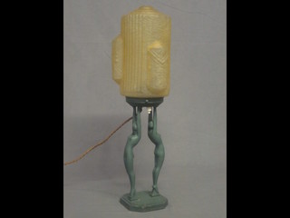 An Art Deco style metal table lamp in the form of 2 standing  verdigris naked ladies