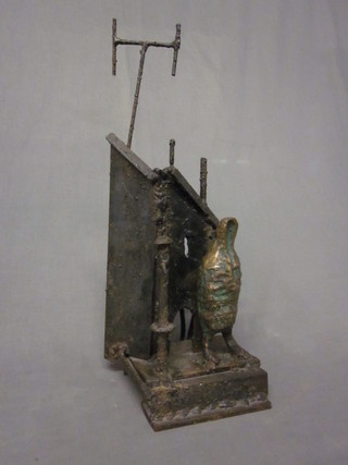 A modern art bronzed sculpture of a standing figure 20"