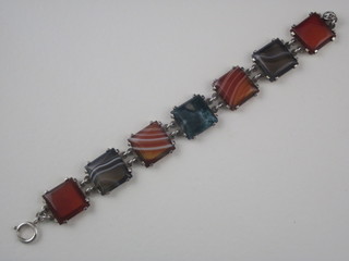 A silver bracelet set 7 square polished agates, by Robert  Allison, Glasgow 1954