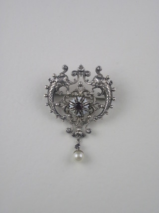 In the manner of Guiliano, a silver and enamelled brooch set red stone and pearl