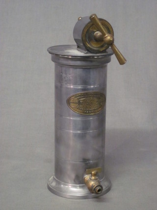A 19th Century French pewter and brass mounted enema marked  Veritable Irrigateure
