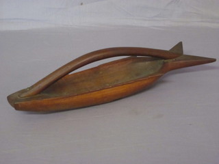 A carved wooden basket/shield in the form of a fish marked souvenir from Pitcairn Islands 16"