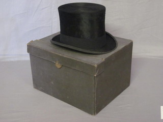 A gentleman's black top hat by Bentals