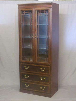 A Georgian style mahogany display cabinet, the interior fitted   shelves enclosed by astragal glazed panelled doors, the base fitted  3 long drawers, raised on bracket feet 31"
