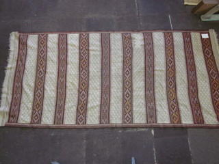 An Antique Kelim rug 140" x 65"