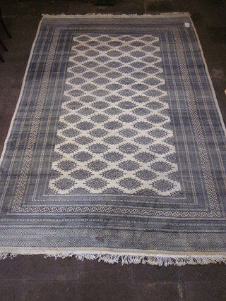 A grey ground Bokhara carpet with numerous octagons to the  centre 165" x 111", some wear