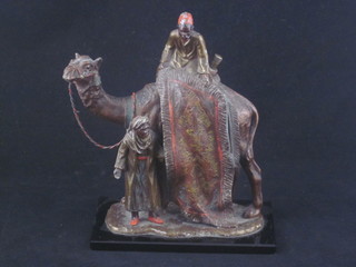 A painted spelter table lighter in the form of a camel with rug  seller 8"  ILLUSTRATED