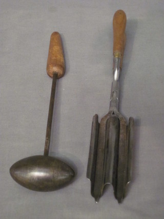 A 19th Century hat iron and a pair of curling tongs