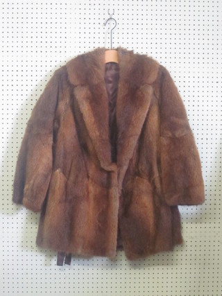 A lady's quarter length fur coat