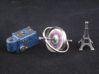 A blue Coronet Midget camera together with a Progress  gyroscope