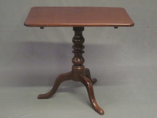 A rectangular mahogany snap top wine table, raised on pillar and tripod supports 30"
