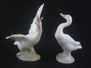 A Lladro figure of a goose with wings extended 4" and 1 other