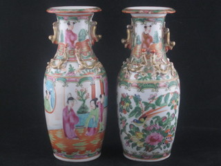 A pair of club shaped Canton porcelain vases decorated floral  panels and court scenes 8"  ILLUSTRATED