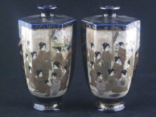 A pair of octagonal Japanese Satsuma vases decorated court figures, 6"