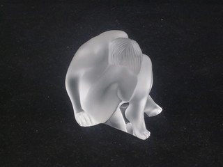 A 1993 Lalique glass figure of a crouching nude, 2", boxed