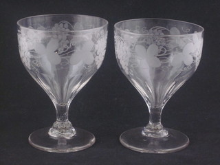 A pair of 18th/19th Century etched glass wine vases with vinery decoration