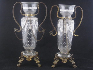 A pair of glass and enamelled decorated vases, raised in gilt metal twin handled mounts 10"  ILLUSTRATED