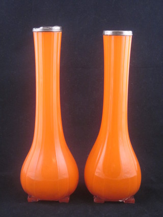 A pair of Art Deco orange club shaped glass specimen vases with silver rims 10"
