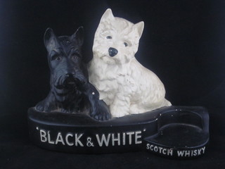 A plaster Brentleigh ware pottery Black & White Whisky soda siphon stand, slight chip to base, 8 1/2"
