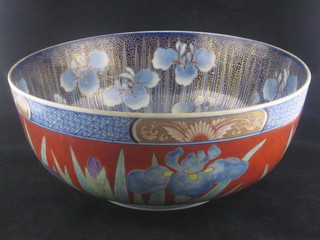 A circular Oriental porcelain bowl, the interior with floral decoration having a panel depicting a Junk, 13", base with seal  mark  ILLUSTRATED