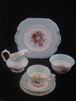 A 19 piece Hammersley tea service with duck egg blue border  and floral decoration comprising 10" twin handled plate, 4 tea  plates 6", 6 cups and 6 saucers, 1 cup chipped, milk jug and  sugar bowl