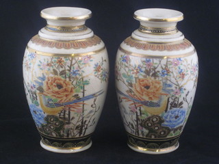 A pair of late Japanese Satsuma pottery vases of club form 7"