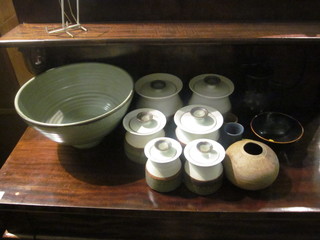 A circular Art Pottery bowl 11", 5 Art Pottery storage jars, 2  with chips to rim and a small collection of Art Pottery