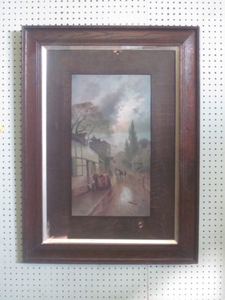 After F Arnold, an Edwardian coloured print "Street Scene with Figures" 17" x 9 1/2", contained in an oak frame