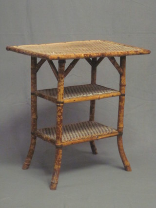 A rectangular bamboo 3 tier occasional table 26"