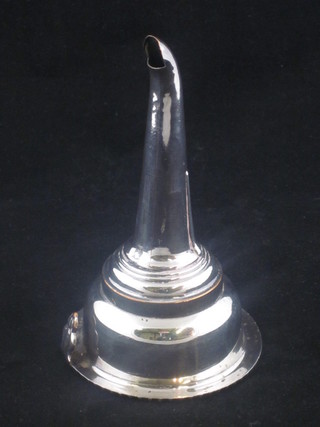 A silver plated wine funnel