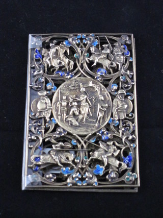 An Art Nouveau pierced gilt metal and turquoise set book cover decorated Knights