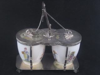 An Edwardian silver plated and glass twin section preserve dish with hinged lid