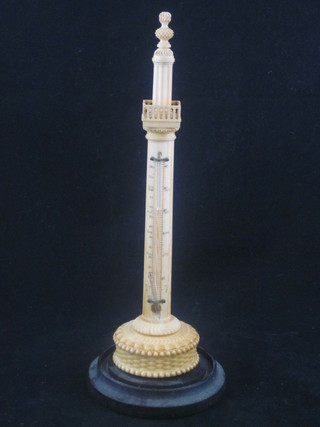 A carved ivory desk thermometer, in the form of a reeded  obelisk, raised on a wooden stand, 9", thermometer f,